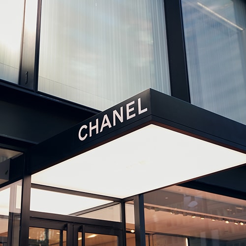 Sidewalk view of a foyer of a Chanel boutique in New York City